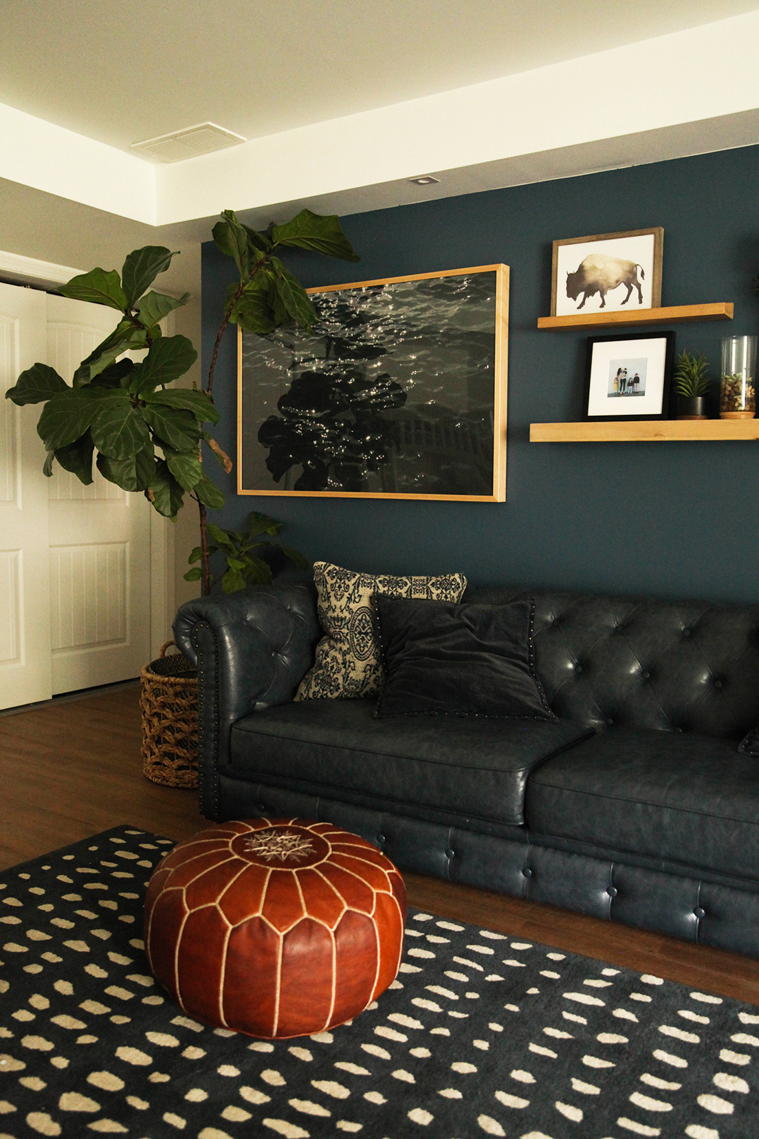 faux leather sofa - navy bedroom