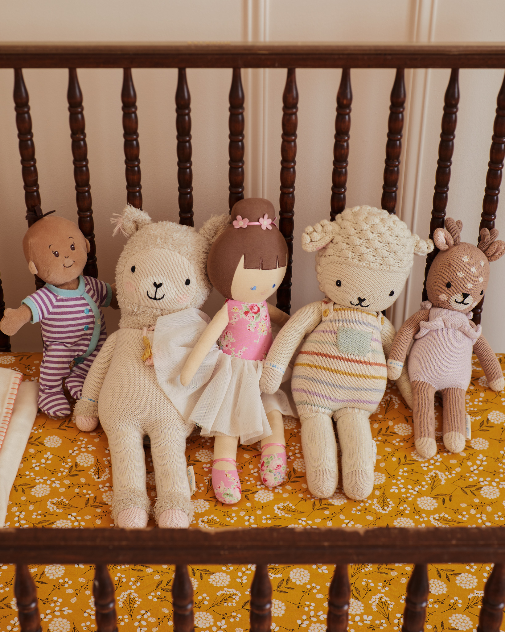 crib sheet bedding, cuddle and kind stuffed animals