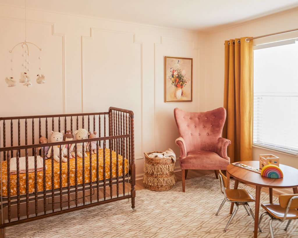 nursery design, velvet chair, vintage crib