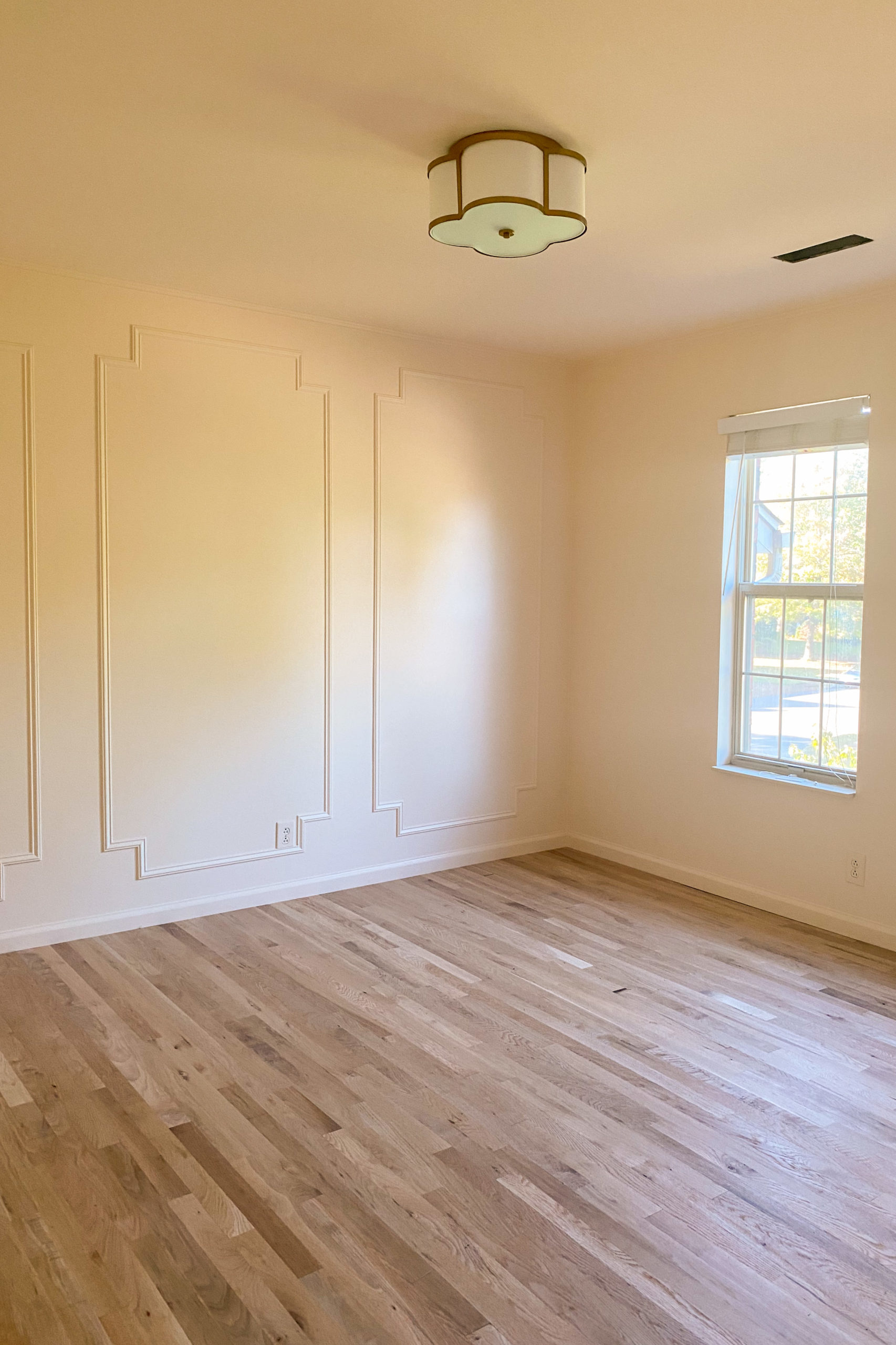 white oak floors, peach paint walls