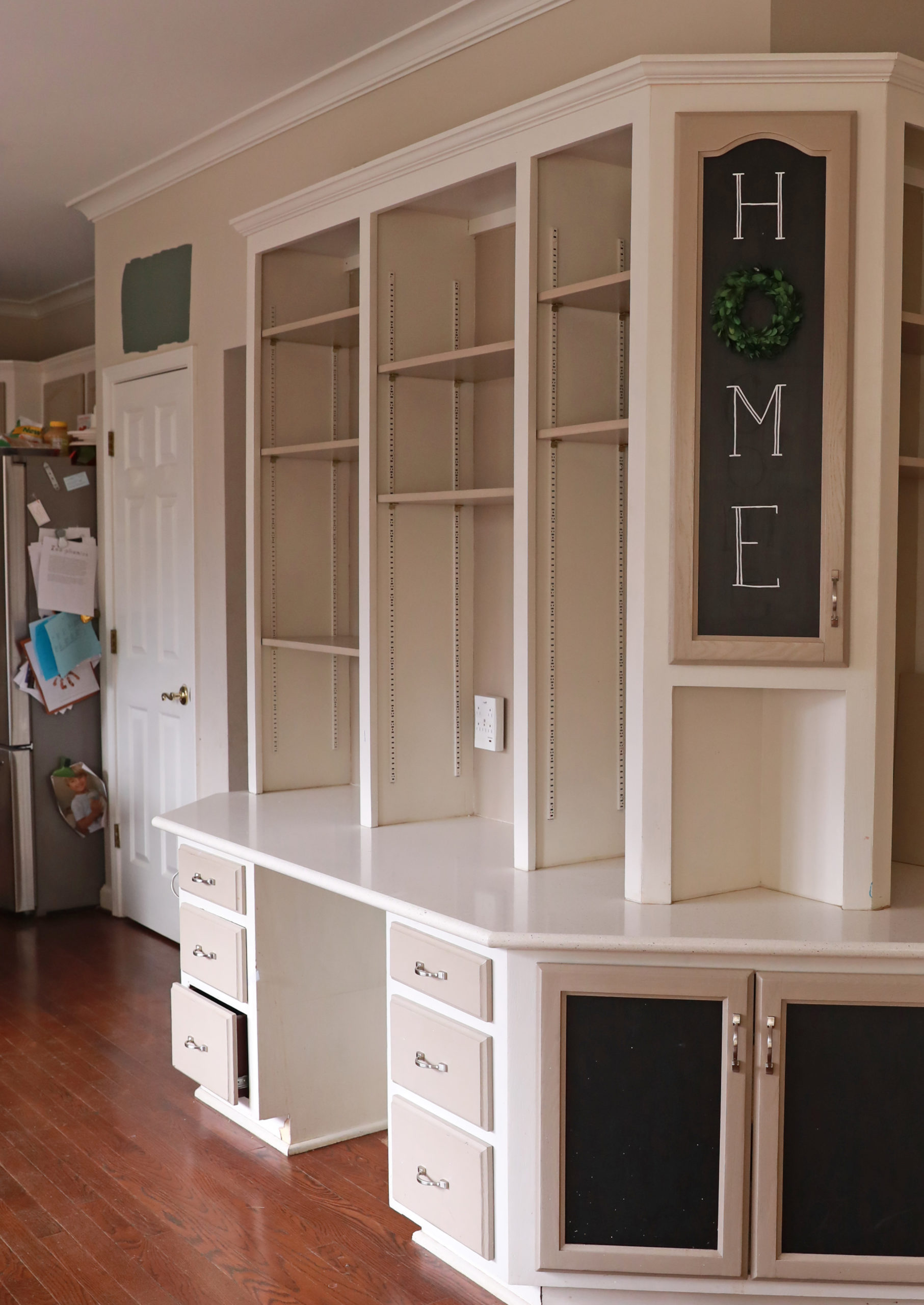 HGTV's Cousins Undercover incorporated a built-in cabinet that doubles as a  desk into a new design.