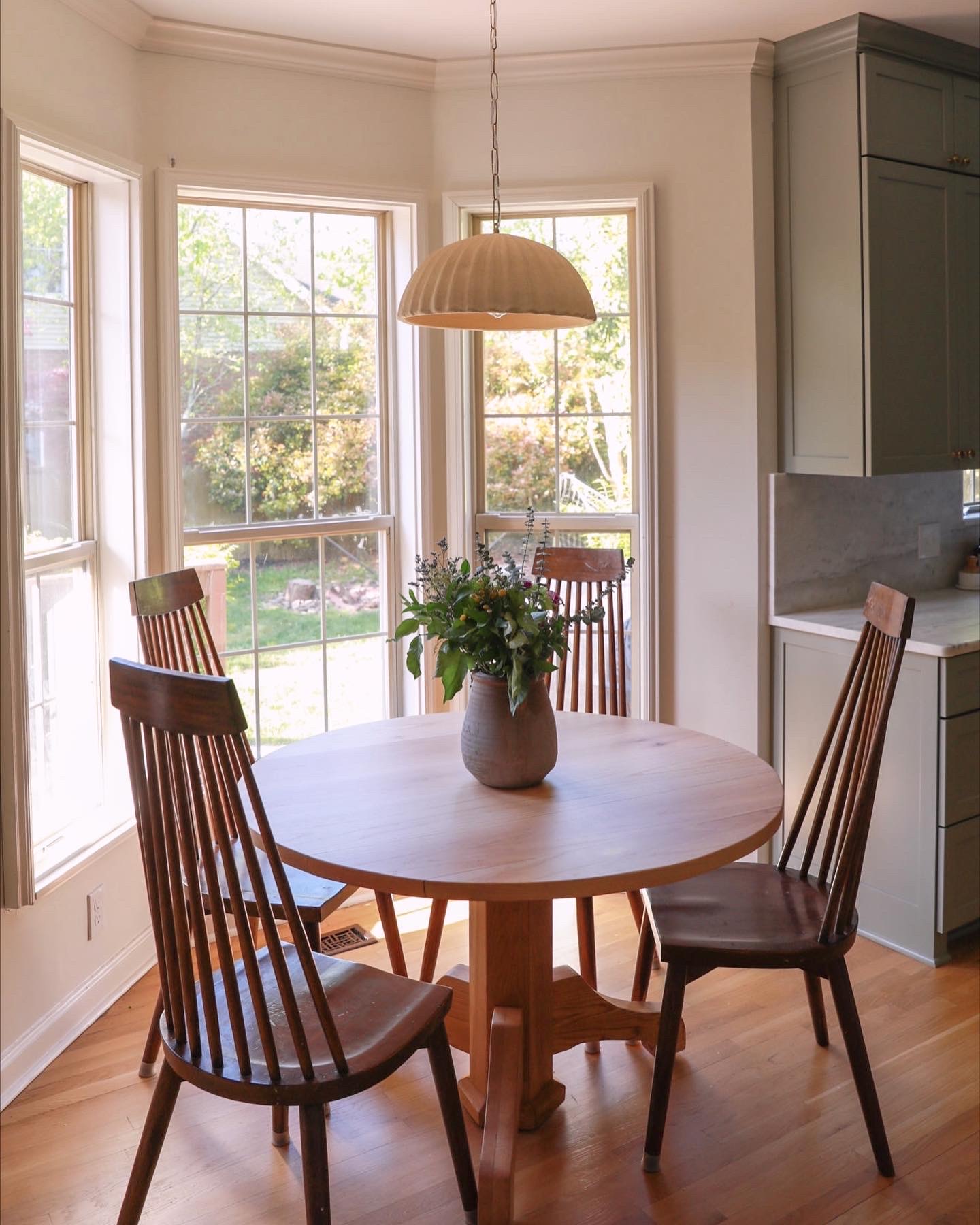 round dining table - breakfast nook - pleated pendant