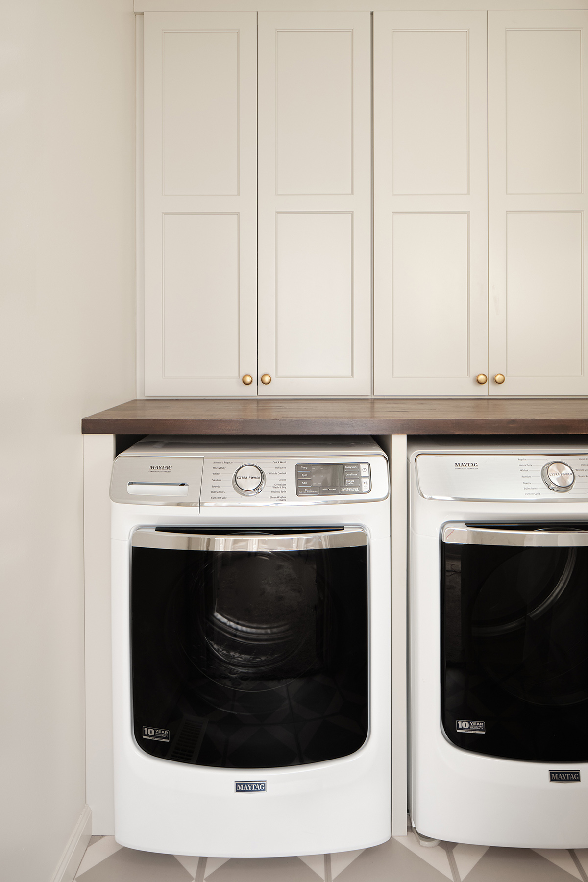 small laundry room design - maytag front loader