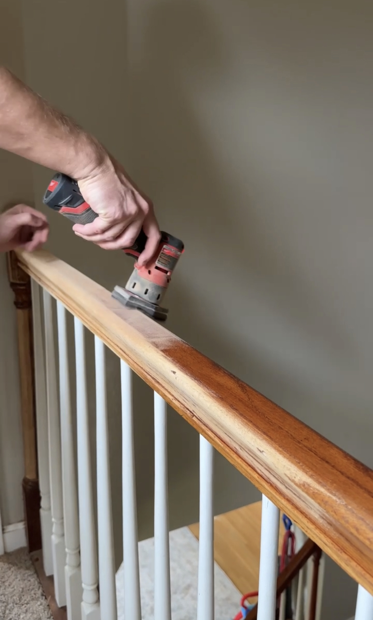 sanding staircase railings
